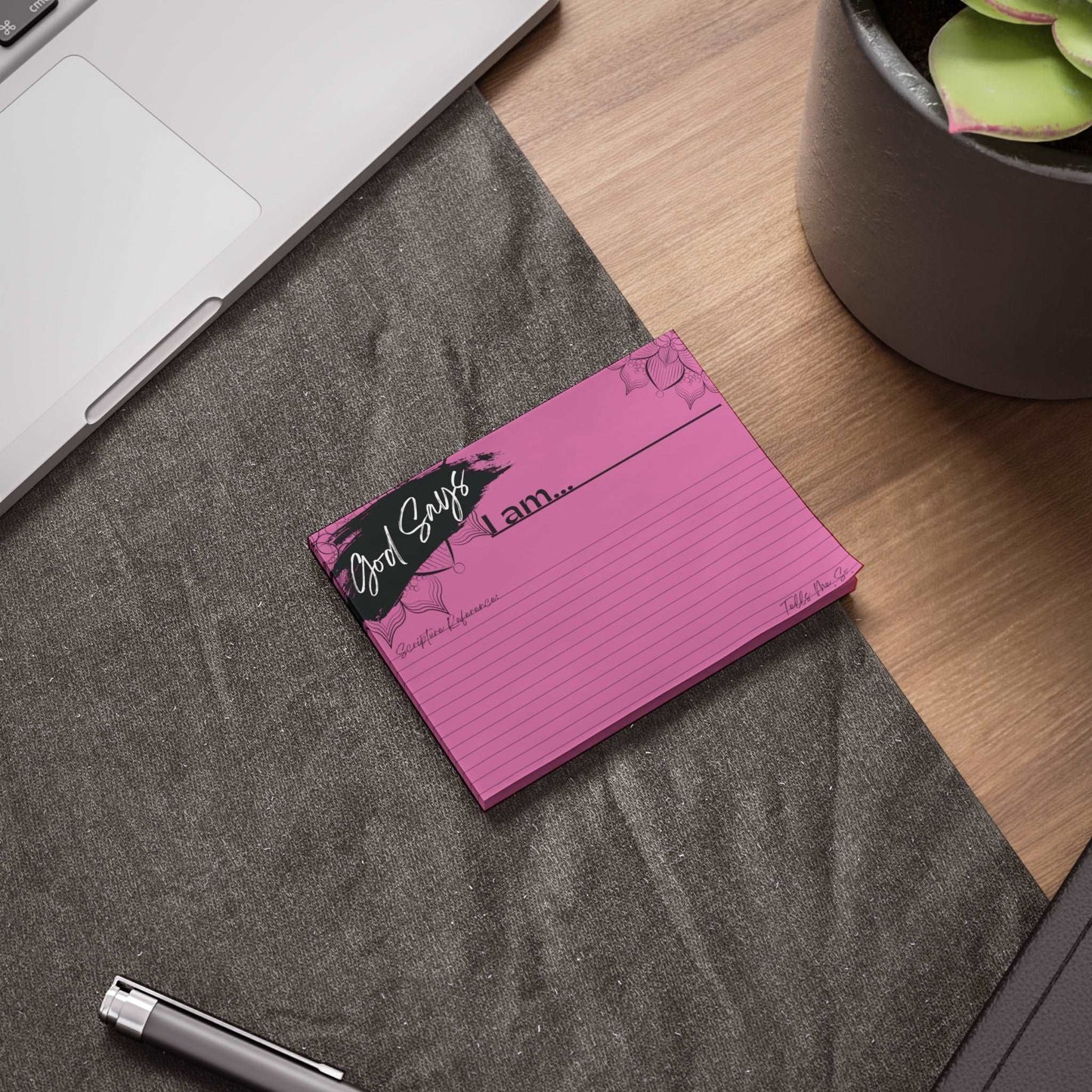 Biblical Affirmations Pink Post-it Note Pad 4 x 3 size example on a work desk.