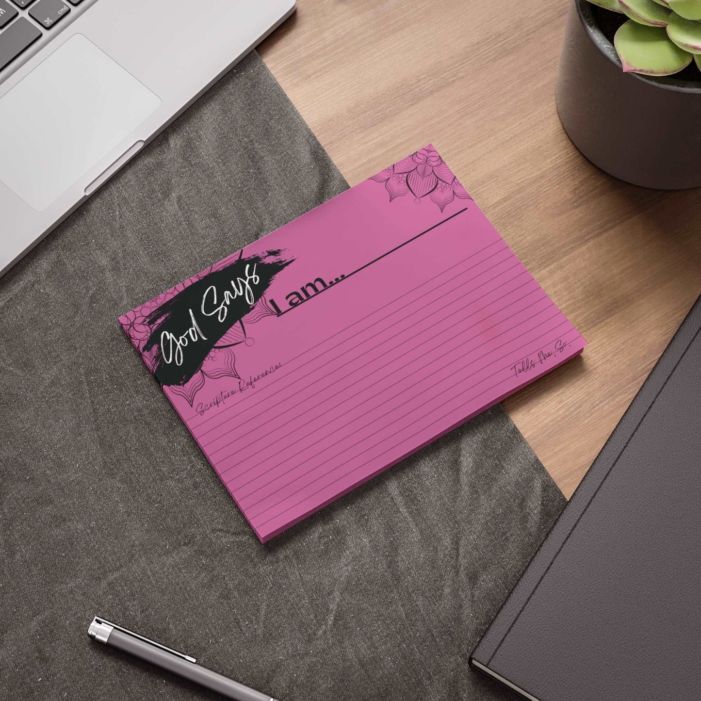 Biblical Affirmations Pink Post-it Note Pad 8 x 6 size example on a work desk.
