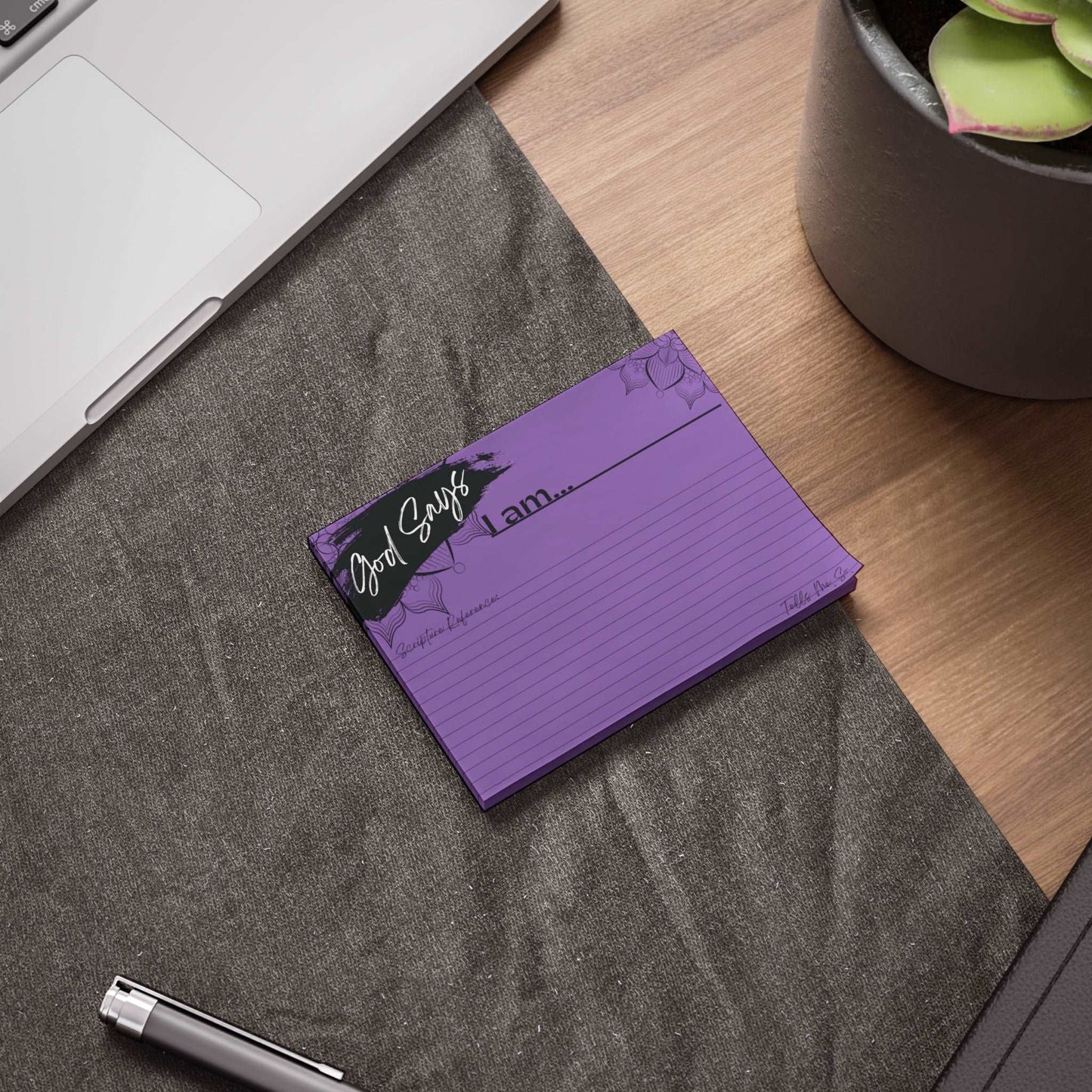 Biblical Affirmations Purple Post-it Note Pad 4 x 3 size example on a work desk.