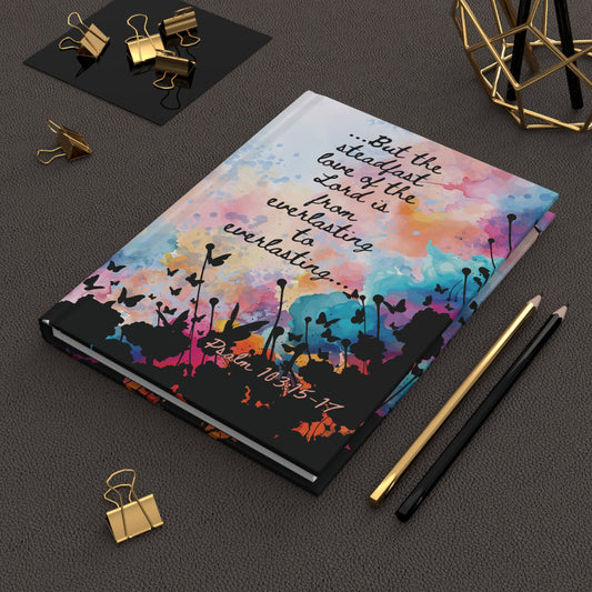 Everlasting to Everlasting Hardcover Christian Journal displayed on a leather desk mat beside several pencils and clips—perfect for Bible study, journaling, or devotional time.