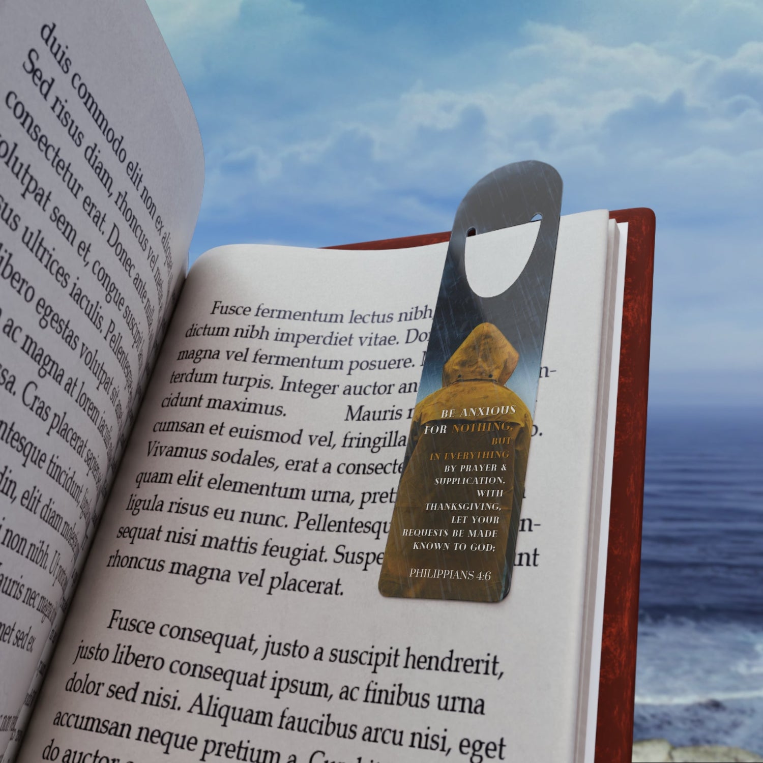 Philippians 4:6 A Christian Bookmark from the  Sentinel Bookmarks Collection, front view, demoed page holder on an open book page. 