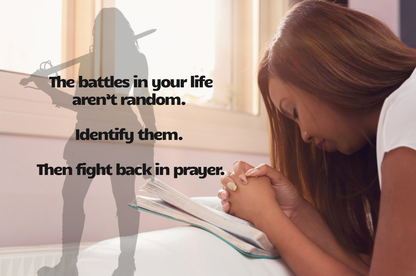Woman praying with a shadowed silhouetted woman holding a sword next to her. Text overlay says: The battles in your life aren't random. identify them. then fight back in prayer. 