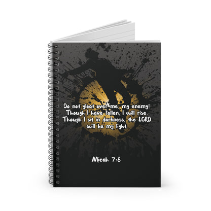 Angle view of slightly open "Don't Gloat over me" Spiral Christian Journal a faith-based journal showing sturdy cover and bold artwork.