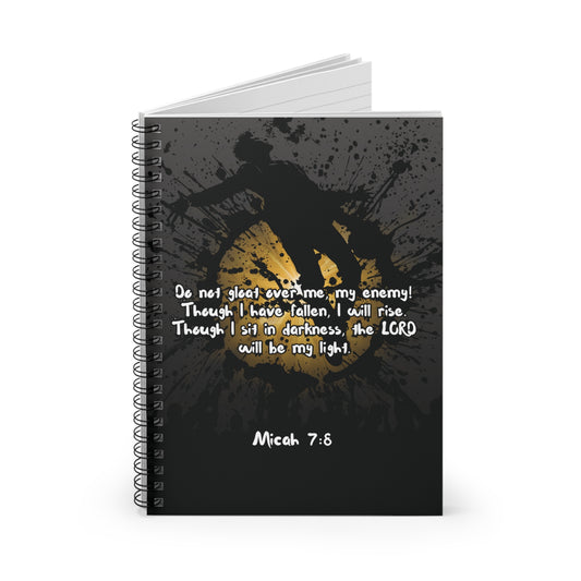 Angle view of slightly open "Don't Gloat over me" Spiral Christian Journal a faith-based journal showing sturdy cover and bold artwork.