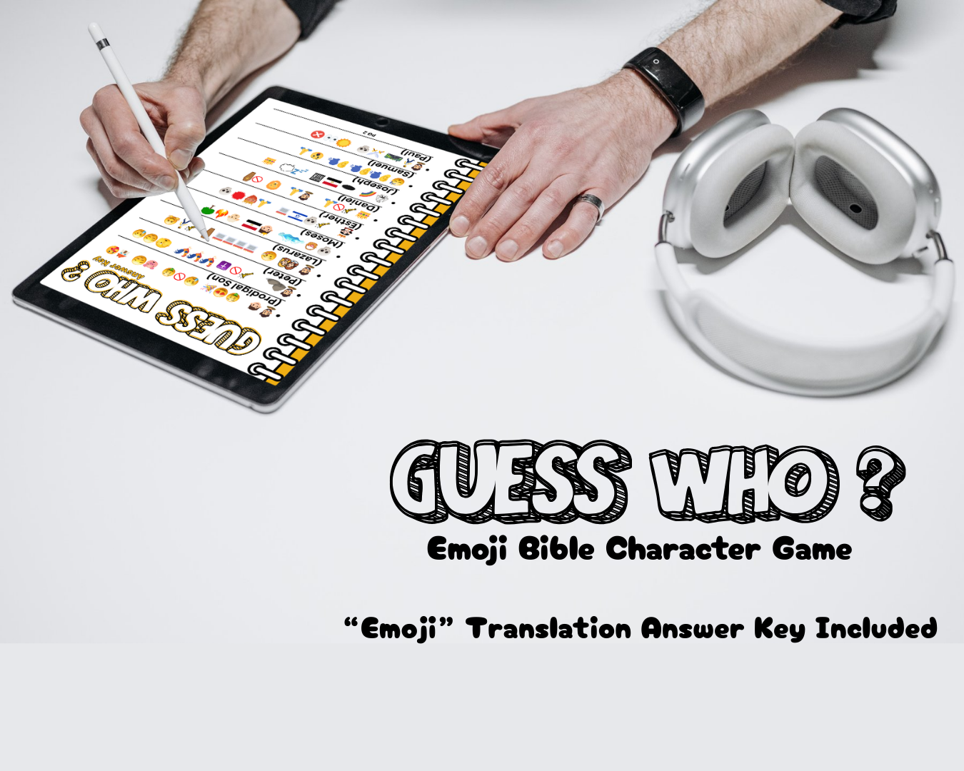 Person using a tablet with the Guess Who emoji Bible Character Game Answer Key displayed, next to headphones on a white background.