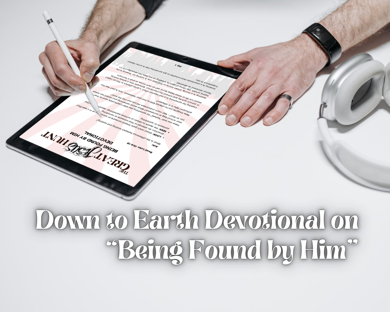 Person using a tablet with the Great Jesus Hunt: Being Found by Him Devotional on a white surface.