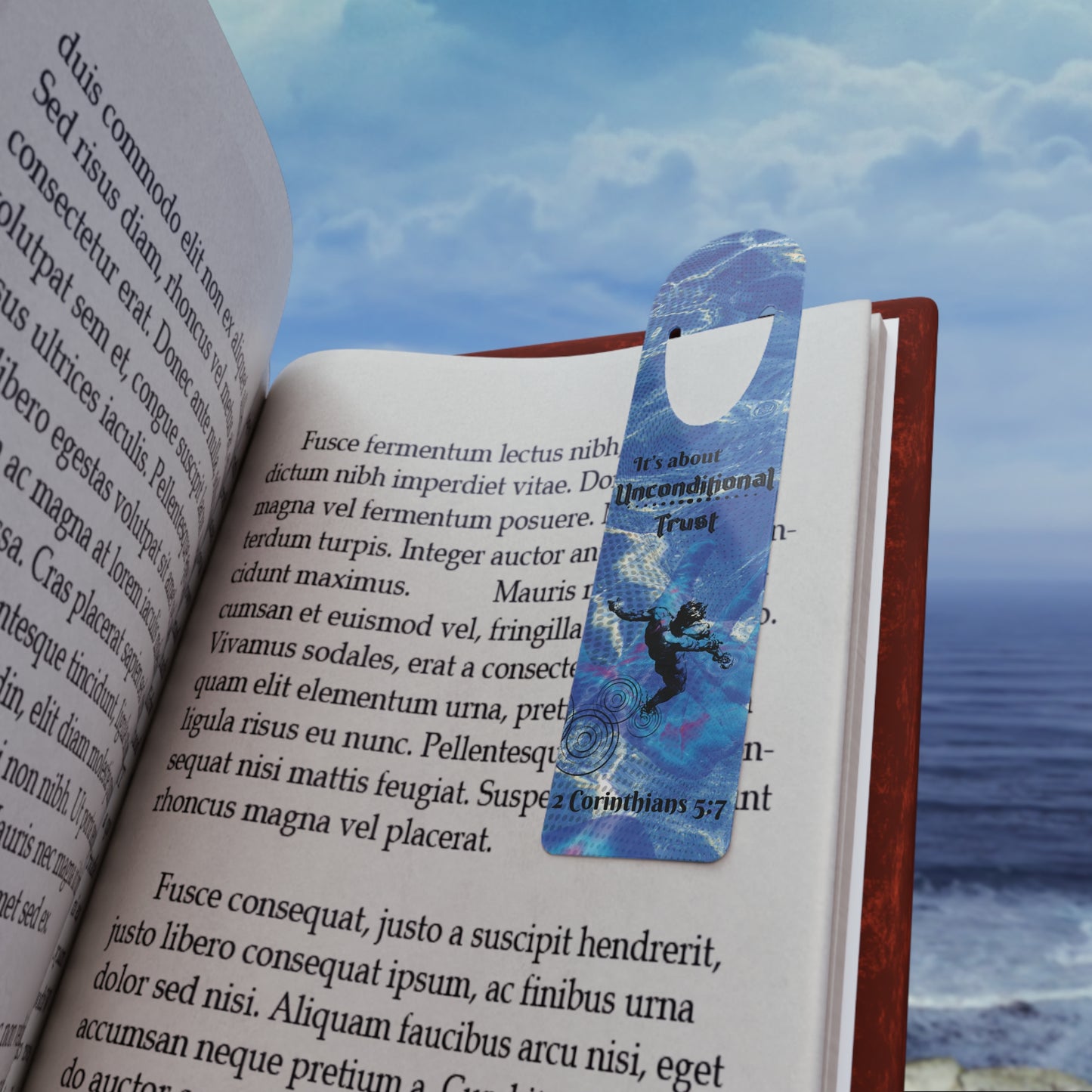 The Bible verse page marker Unconditional Trust, inspired by 2 Corinthians 5:7, is clipped securely to a book page and held in front of a soft beach background. A Christian bookmark made for Bible study, devotionals, or gifting—mark the moment you didn’t quit trusting Him.