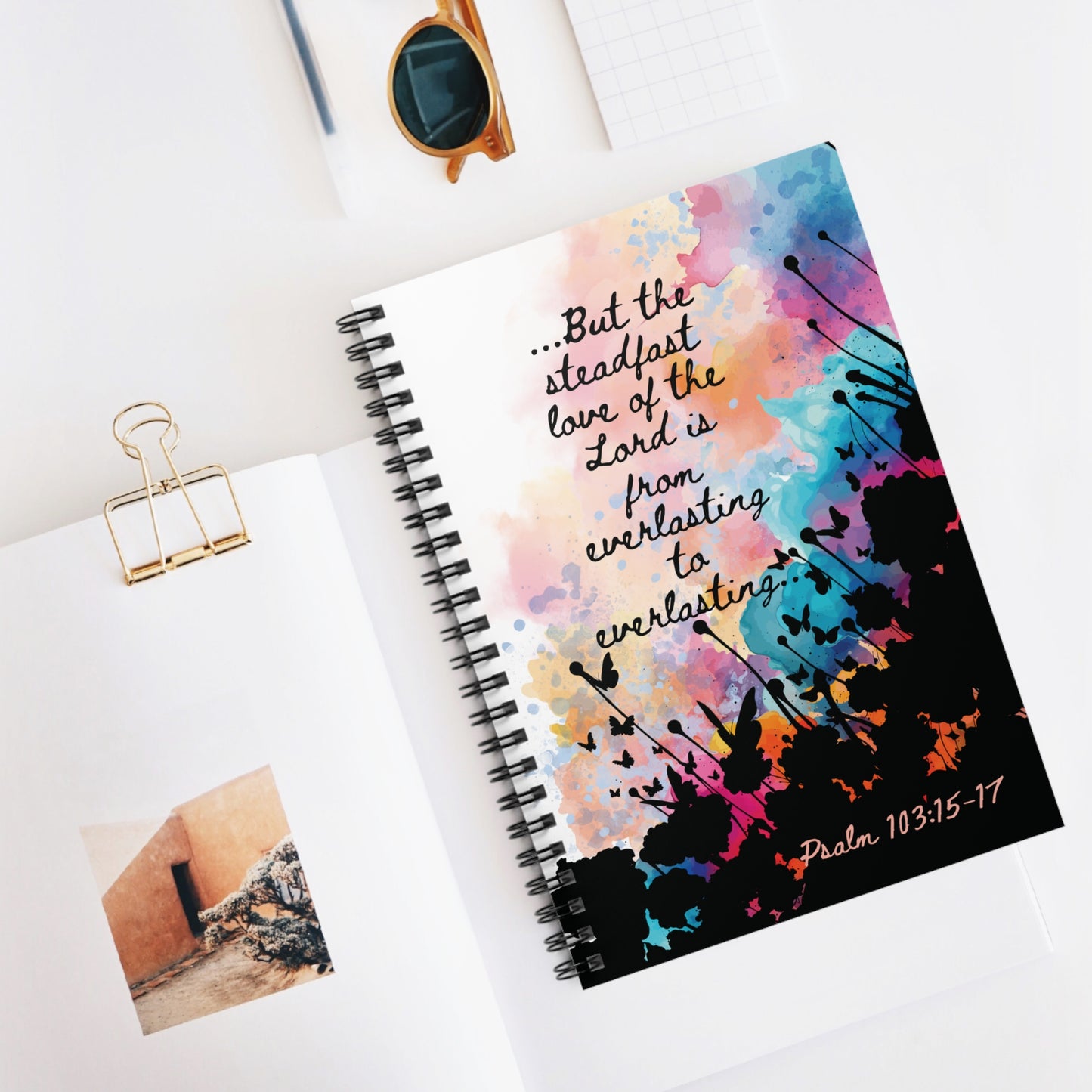 The Everlasting to Everlasting Spiral Christian Journal displayed on a white desk top beside several pencils, papers and clips—perfect for Bible study, journaling, or devotional time.